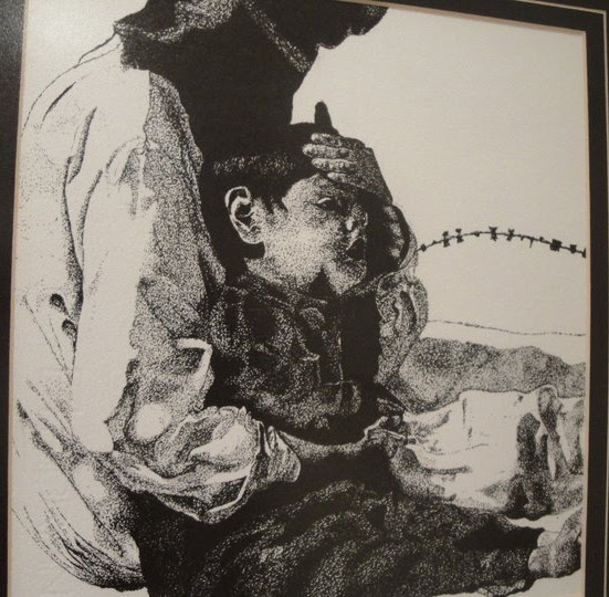 Father comforting his son